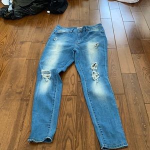 Blue ripped jeans, gently worn